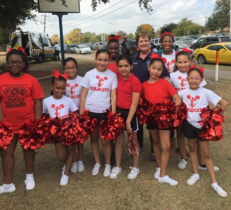 Commissioner Daniel and Julius Dorsey cheer squad