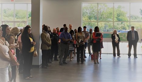 Audience for ribbon cutting