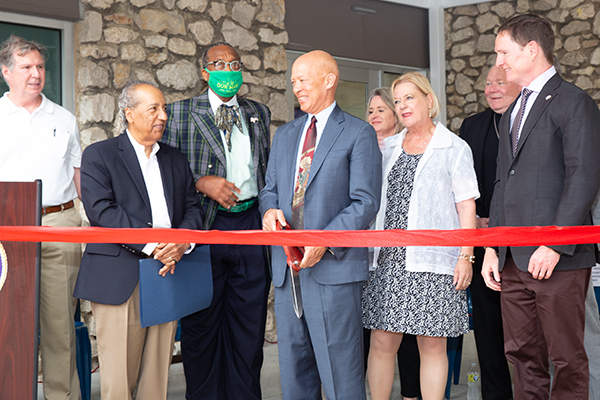 Dallas Deflects Ribbon Cutting Photo