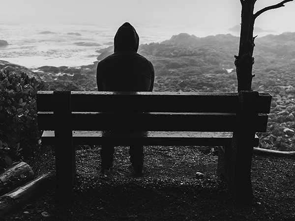 Person on a bench, half disappeared
